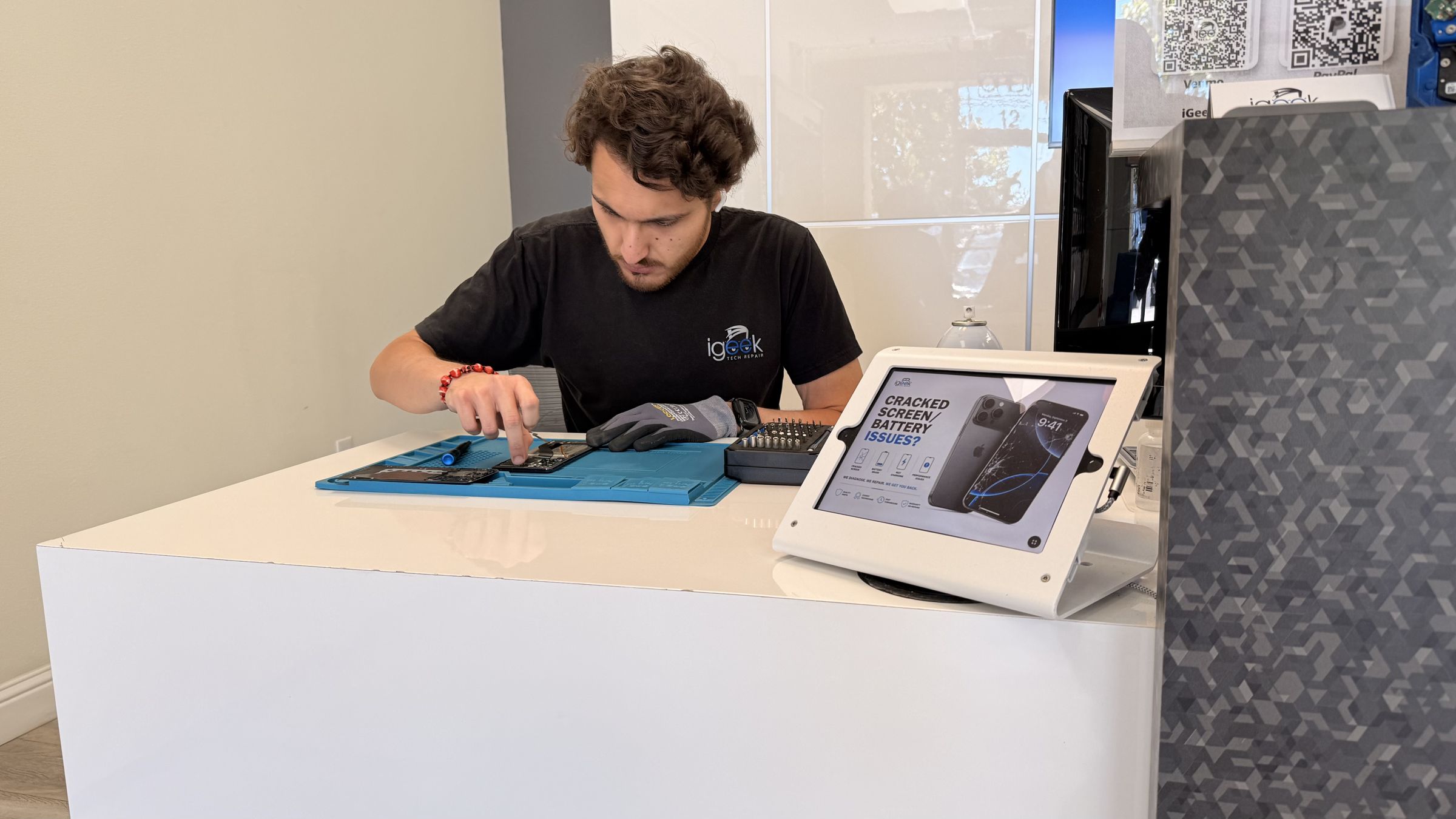 Professional technician working on android repair